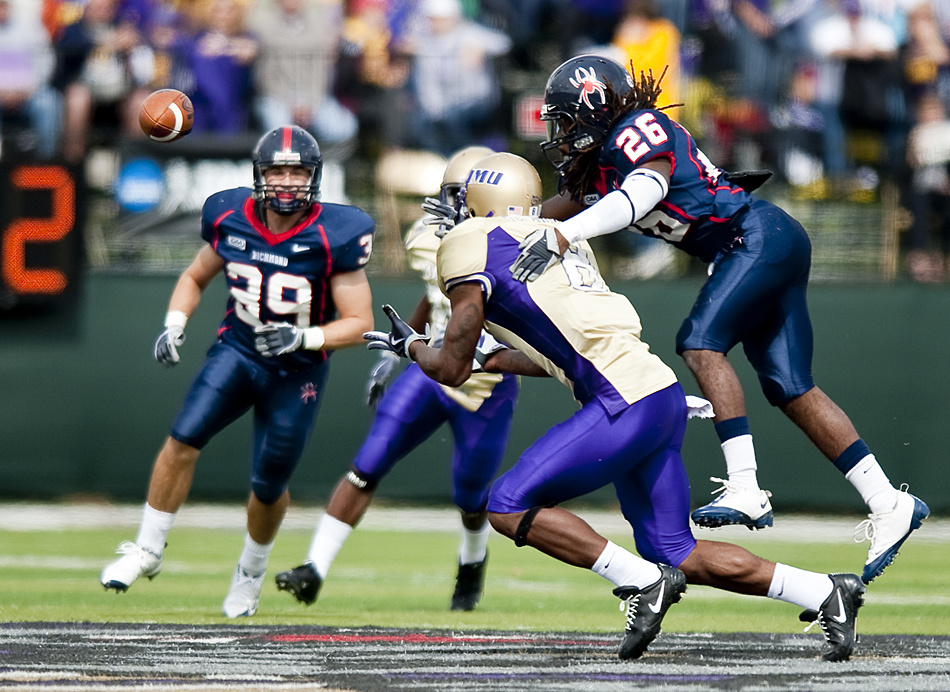 Richmond's Darryl Hamilton breaks up a pass to James Madison's Rockeed McCarter during second quarter action at Bridgeforth Stadium in Harrisonburg on Saturday. Richmond won the game 21-17.